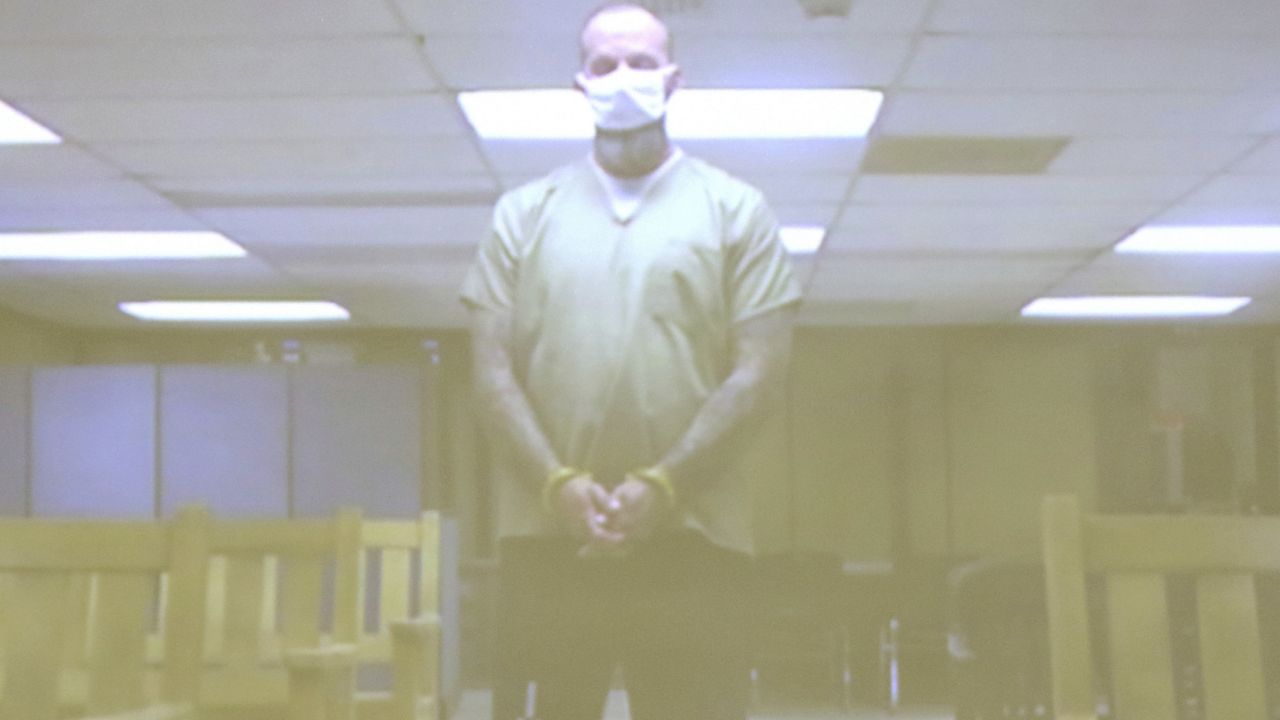 Former Ohio sheriff's deputy charged with murder testifies